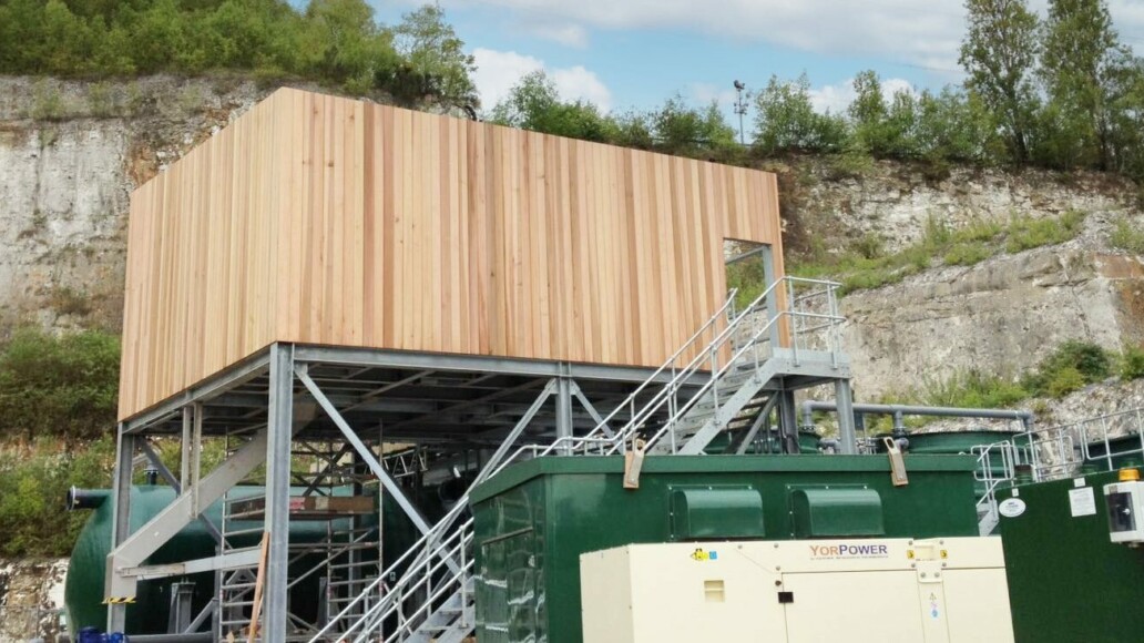 Elevated steel plant access platform with galvanized frame and external cladding