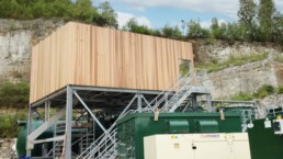 Elevated steel plant access platform with galvanized frame and external cladding