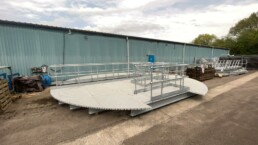 Heavy-duty removable durbar steel covers installed over an industrial service pit