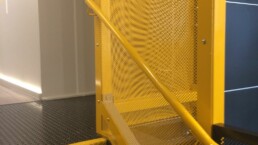Commercial steel staircase and perforated steel enclosure fabricated by RJW Metalworks